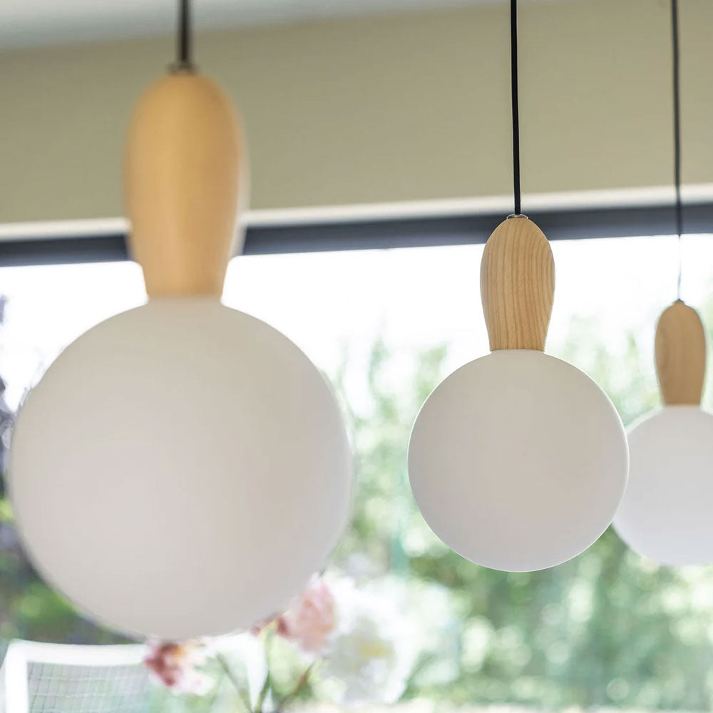 Close up on Well Lit Aspen G200 LED Bulbs being used with the optional Well Lit Woody pendant lights