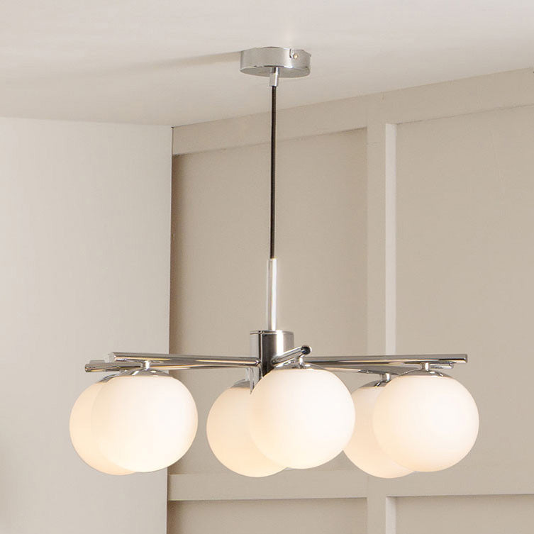 Asterope chrome pendant lights pictured hanging in living room
