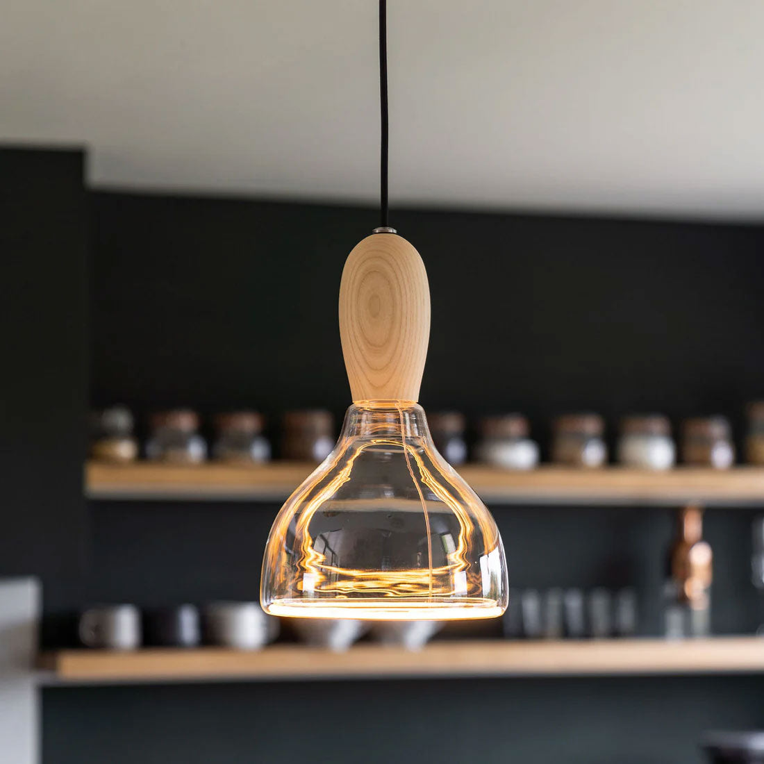 Azure S-Curve E27 Light Bulb shown with optional Well Lit Woody pendant light.
