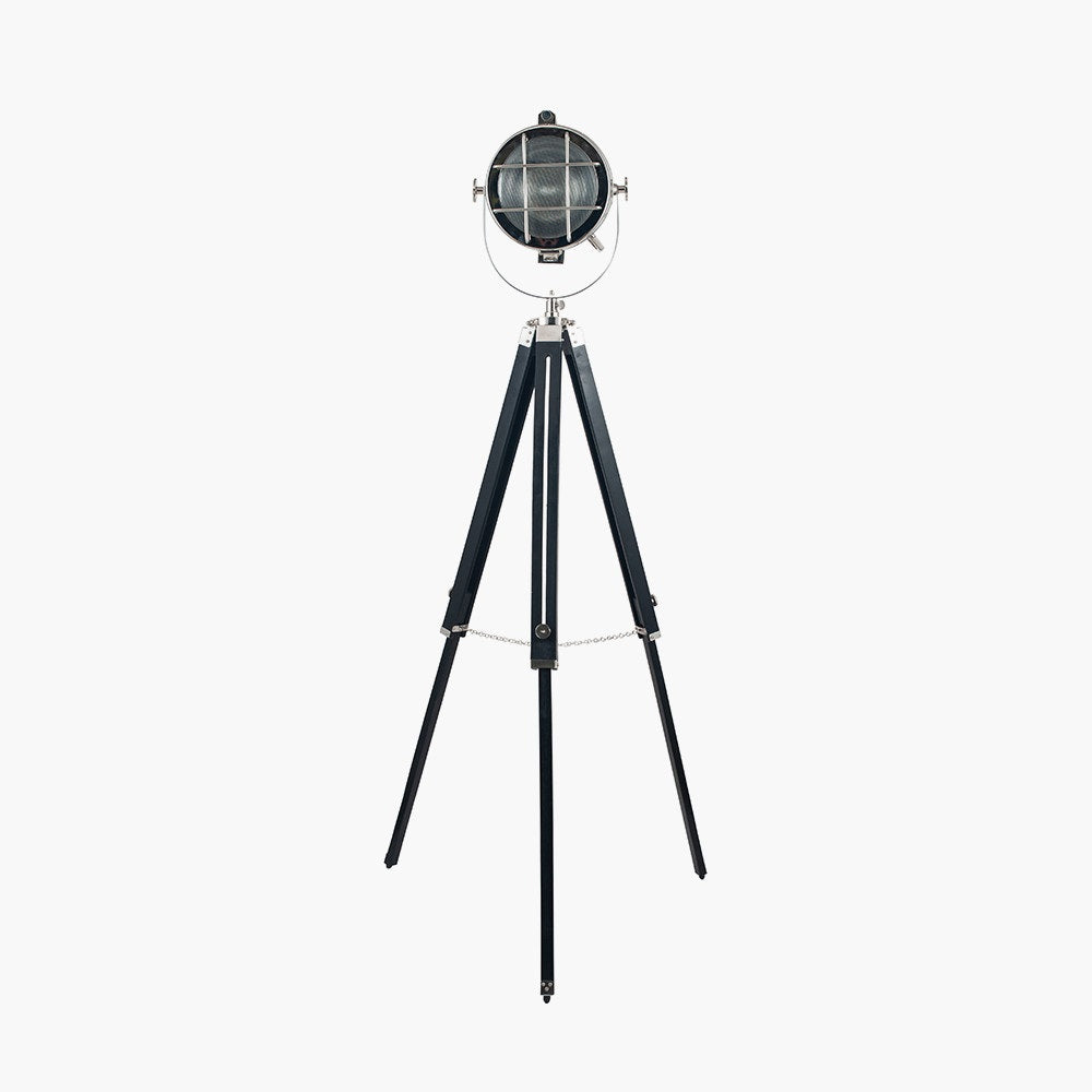 Beckett tripod floor lamp marine features an industrial style grill on the front.