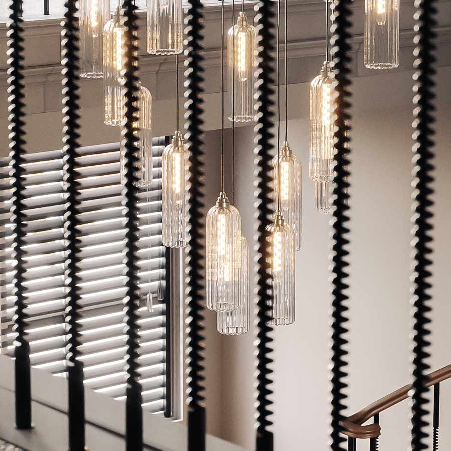 The Bickley blown glass pendant light UK is ideal for stairwells, stairs and other locations - it's sold by South Charlotte Fine Lighting