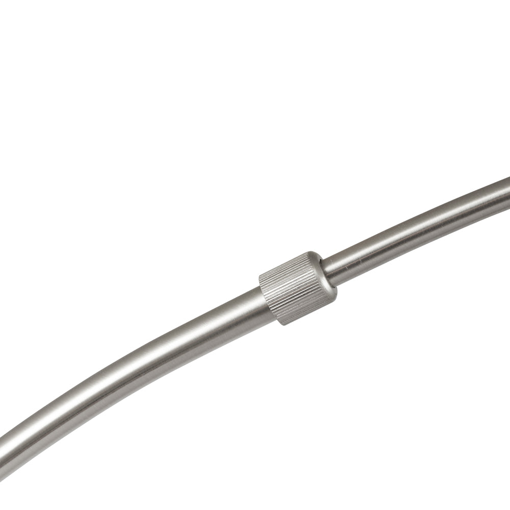 Brushed silver metal arm of living room reading light