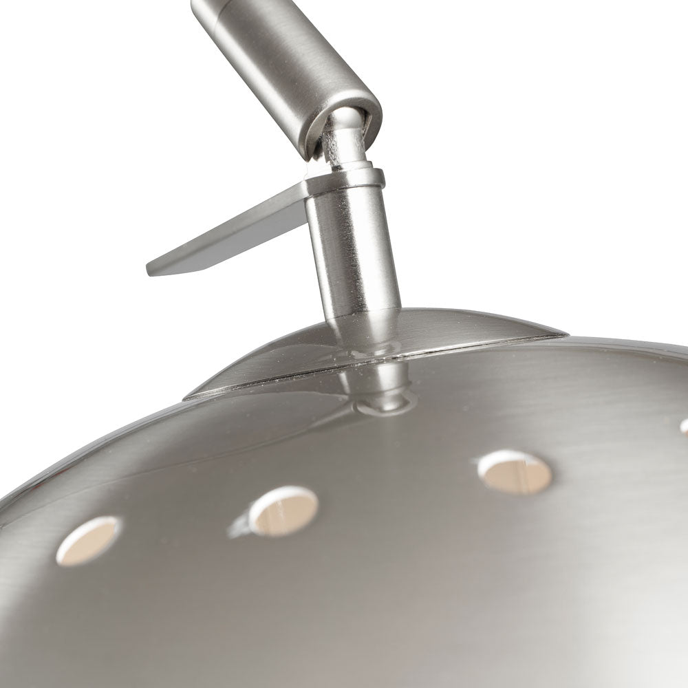 Brushed silver metal detail on adjustable head of living room reading lamp
