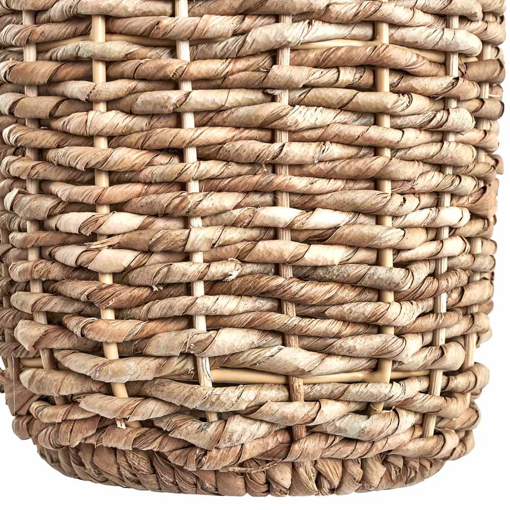 The Acer table lamp base is made from handwoven seagrass
