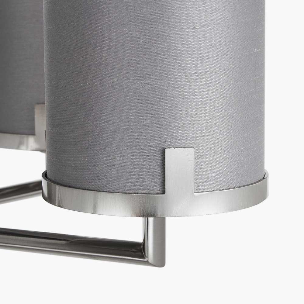 Detail view of brushed nickel pendant lights sold by South Charlotte Fine Lighting