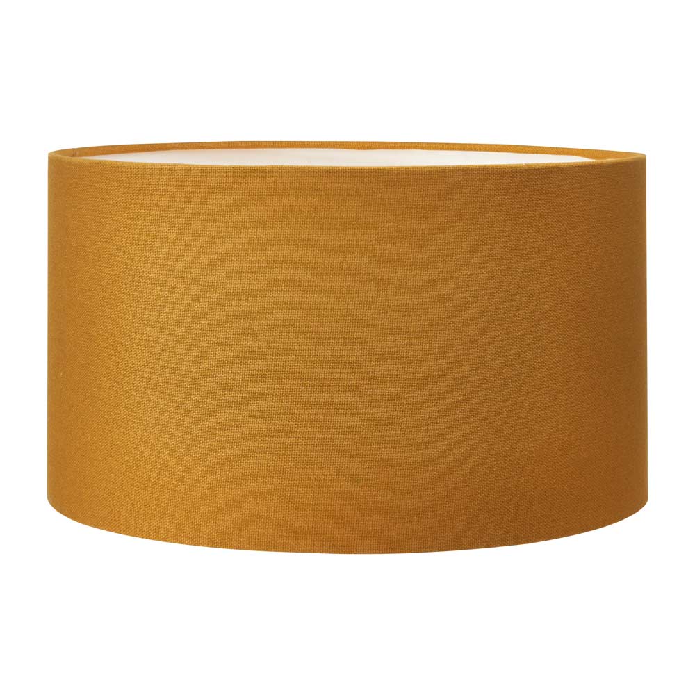 Henry lamp shade in mustard yellow colour with light switched on
