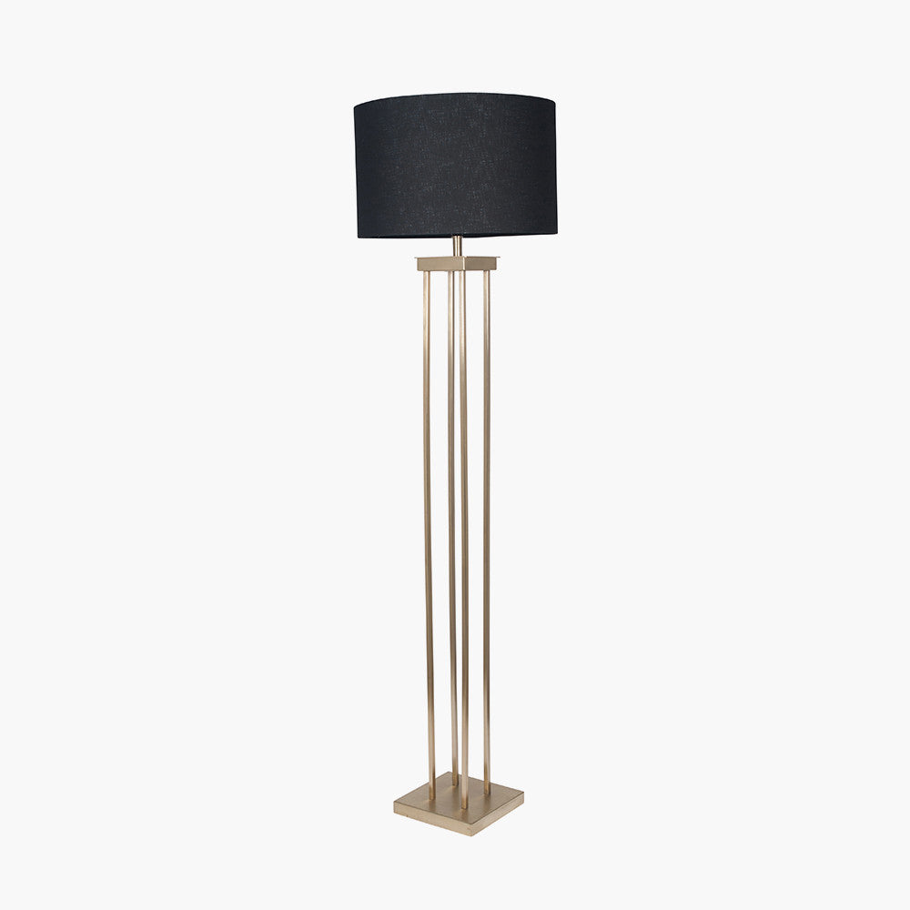 Langston brass floor lamp features four pillars