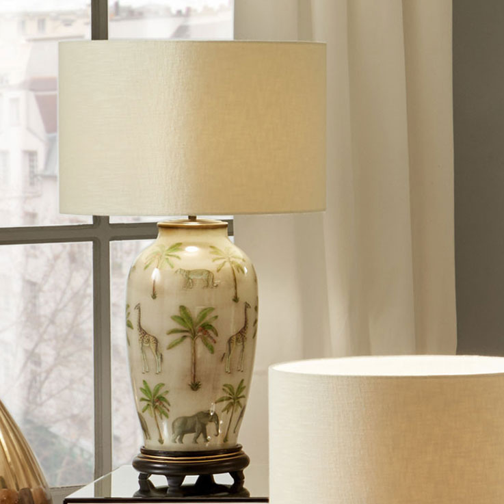 Lifestyle image of African table lamp from Jenny Worrall and sold by South Charlotte Fine Lighting