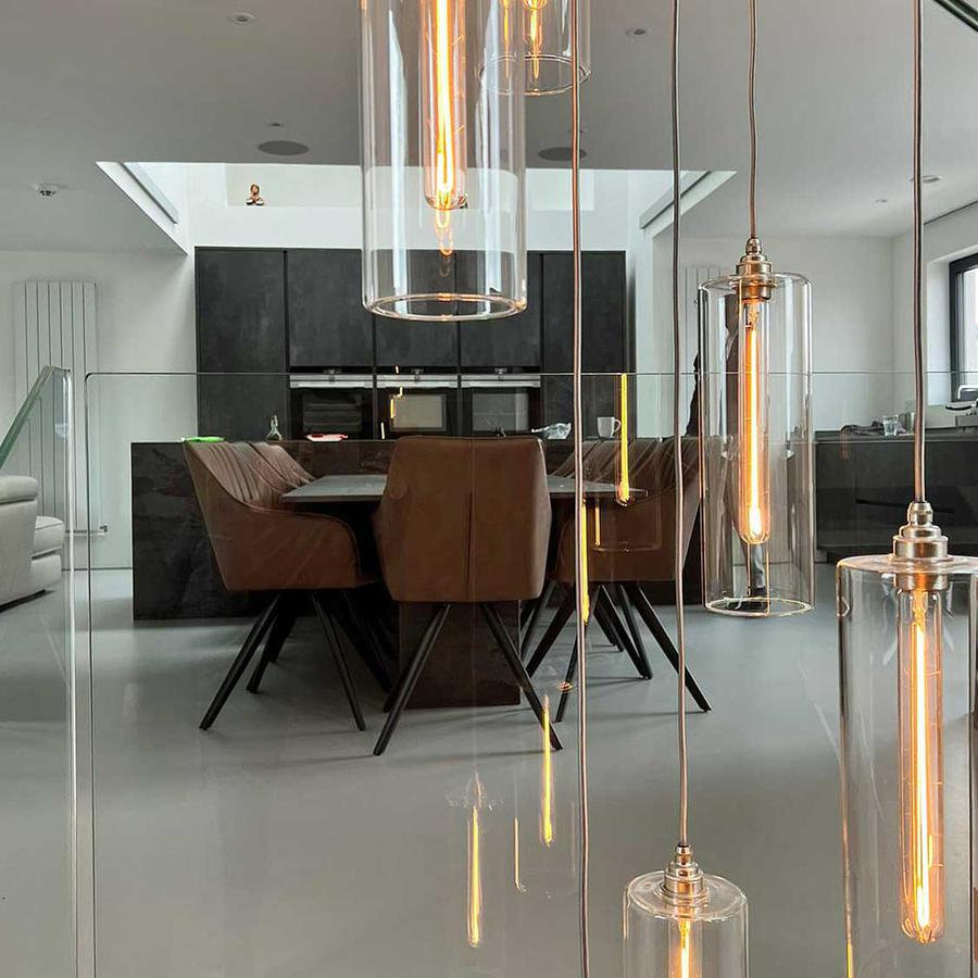 Long cluster pendant light sold by South Charlotte Fine Lighting and featured on TV