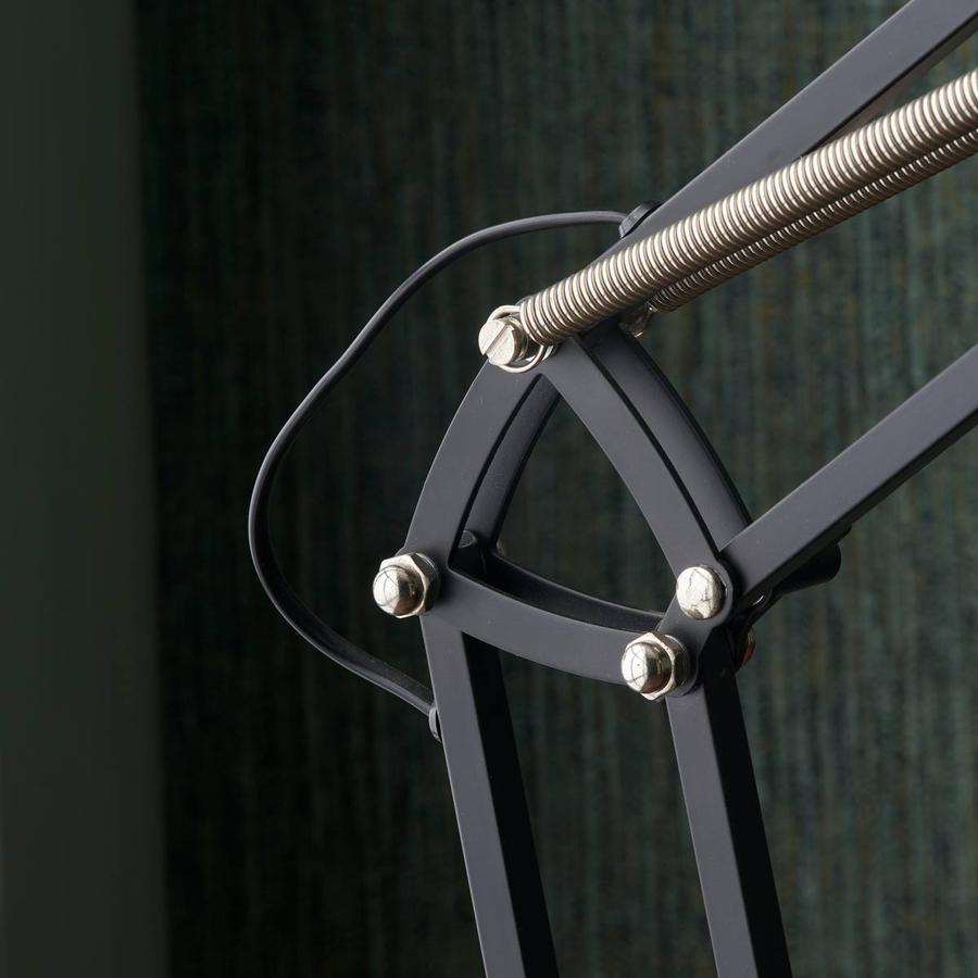 Alonzo reading lamp standing mechanism which allows it to be adjustable and ideal as a reading light