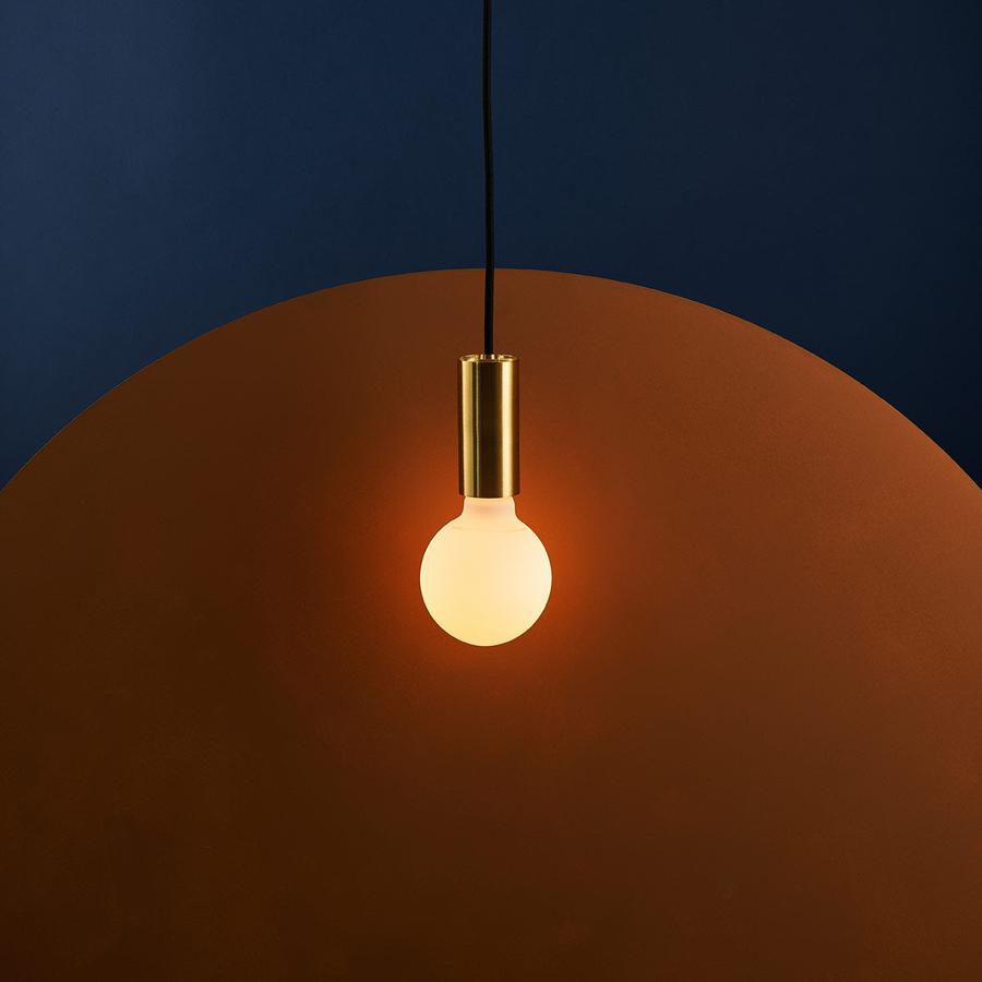 Well Lit Spin Pendant Light is pictured here with the optional Lucina LED light bulb, both of which are available from South Charlotte Fine Lighting