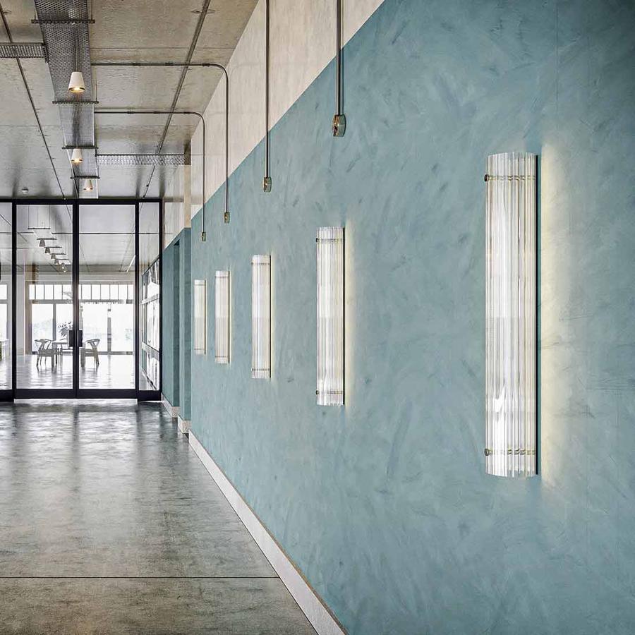 Row of Temple Pillar lights with ribbed glass, installed here in an office development but they are also used in homes