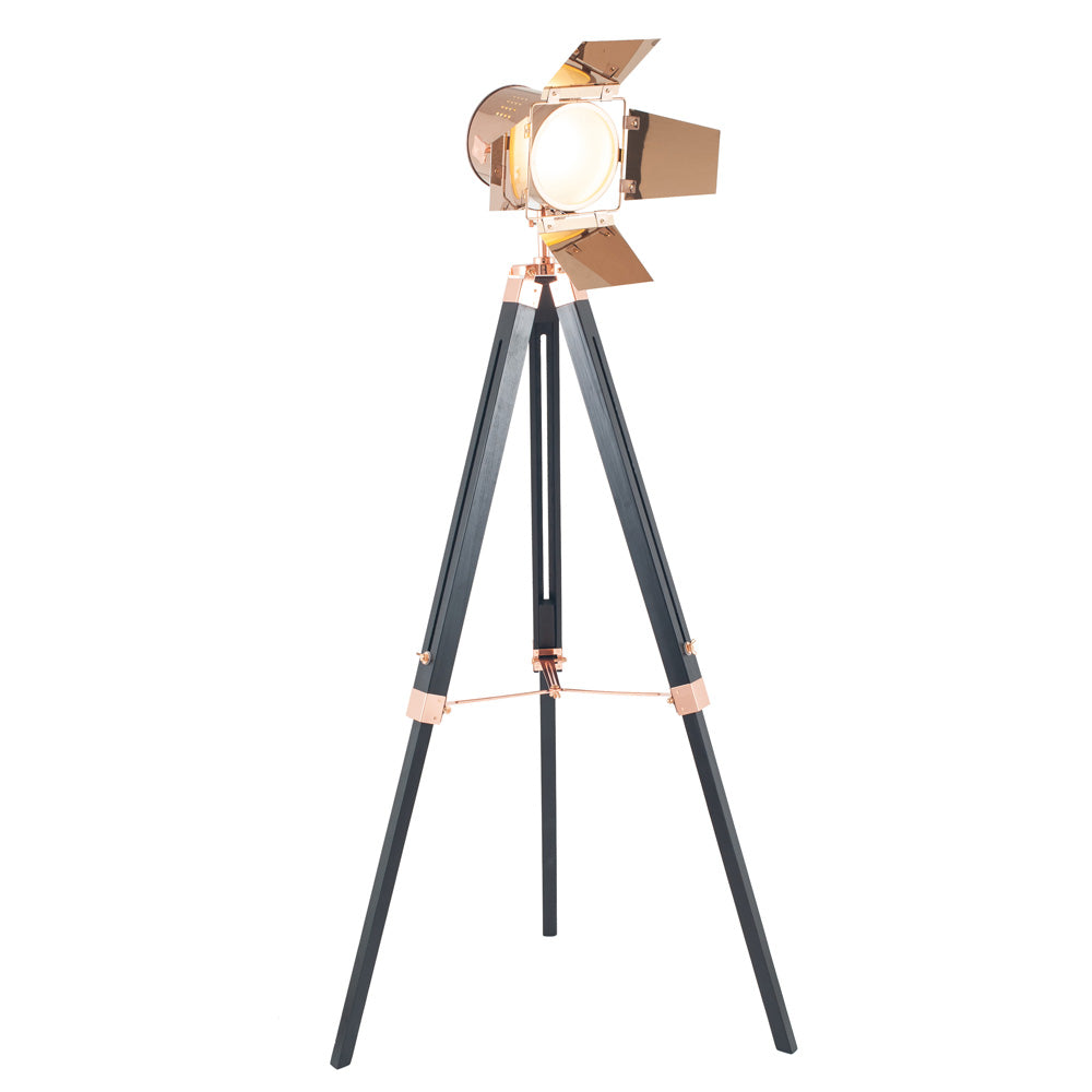 Tripod floor lamp copper with light illuminated