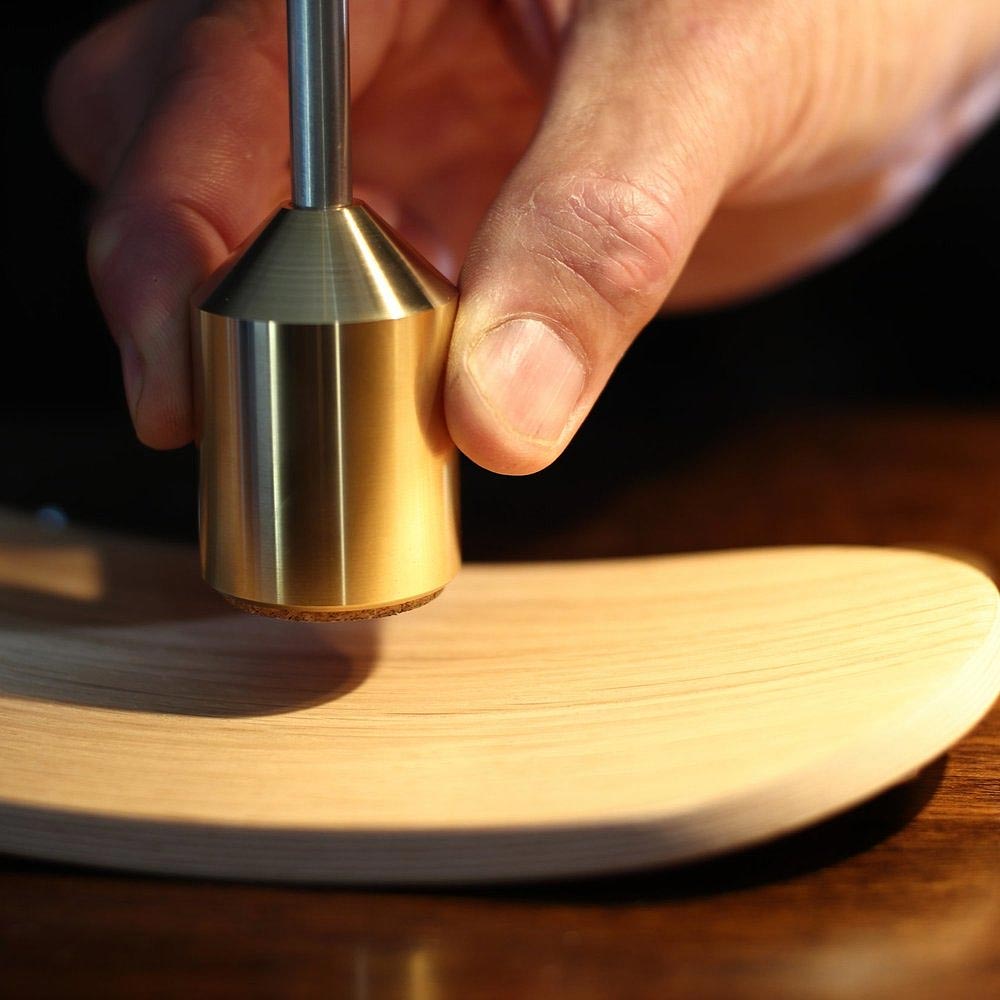 Brass weight shown on rocker of this C-Type Balance Lamp made by Blott Works is what makes it so unusual – the lamp is sold by South Charlotte Fine Lighting