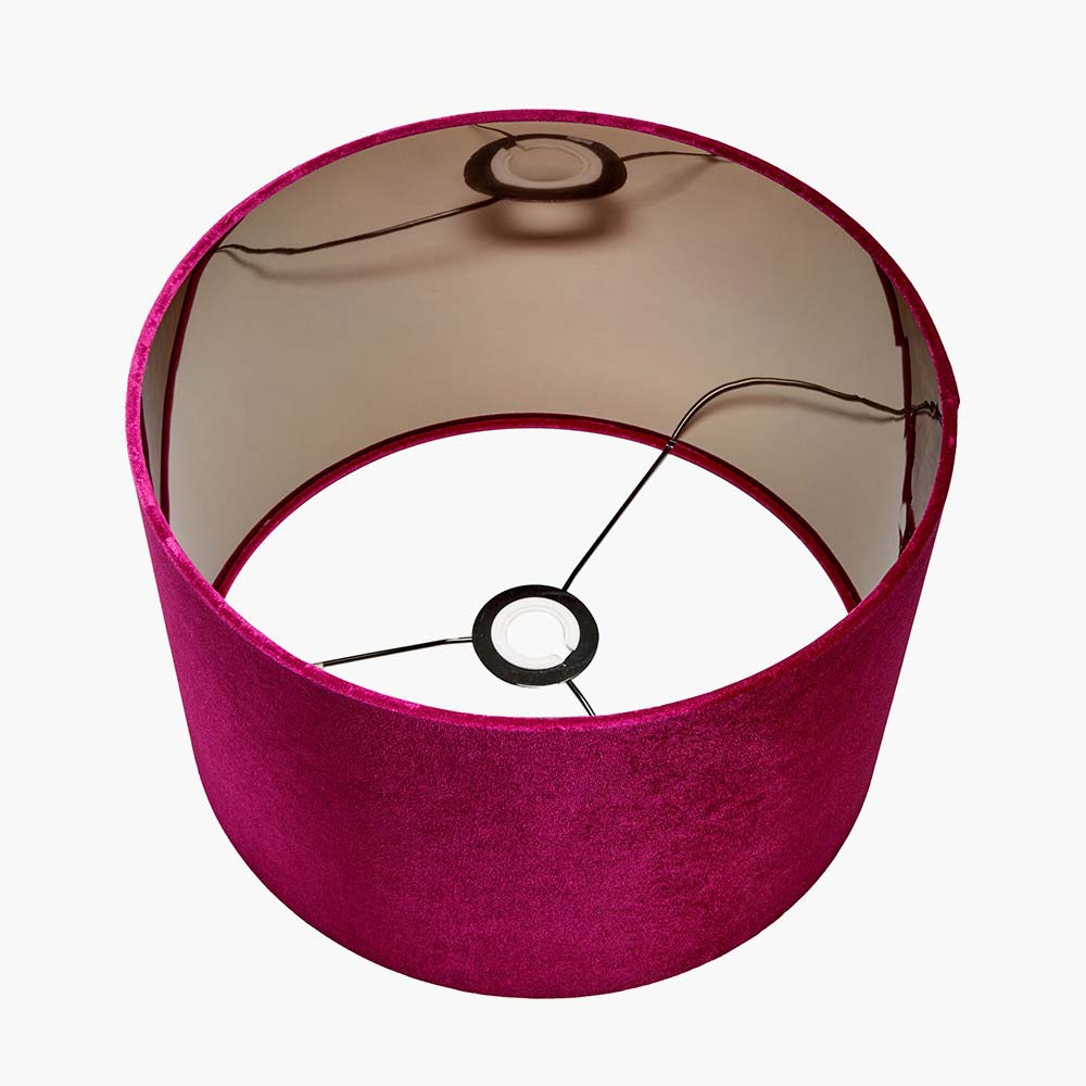 Our raspberry lampshade features a metallic reflective lining to bounce more warm light back into the room of your choice