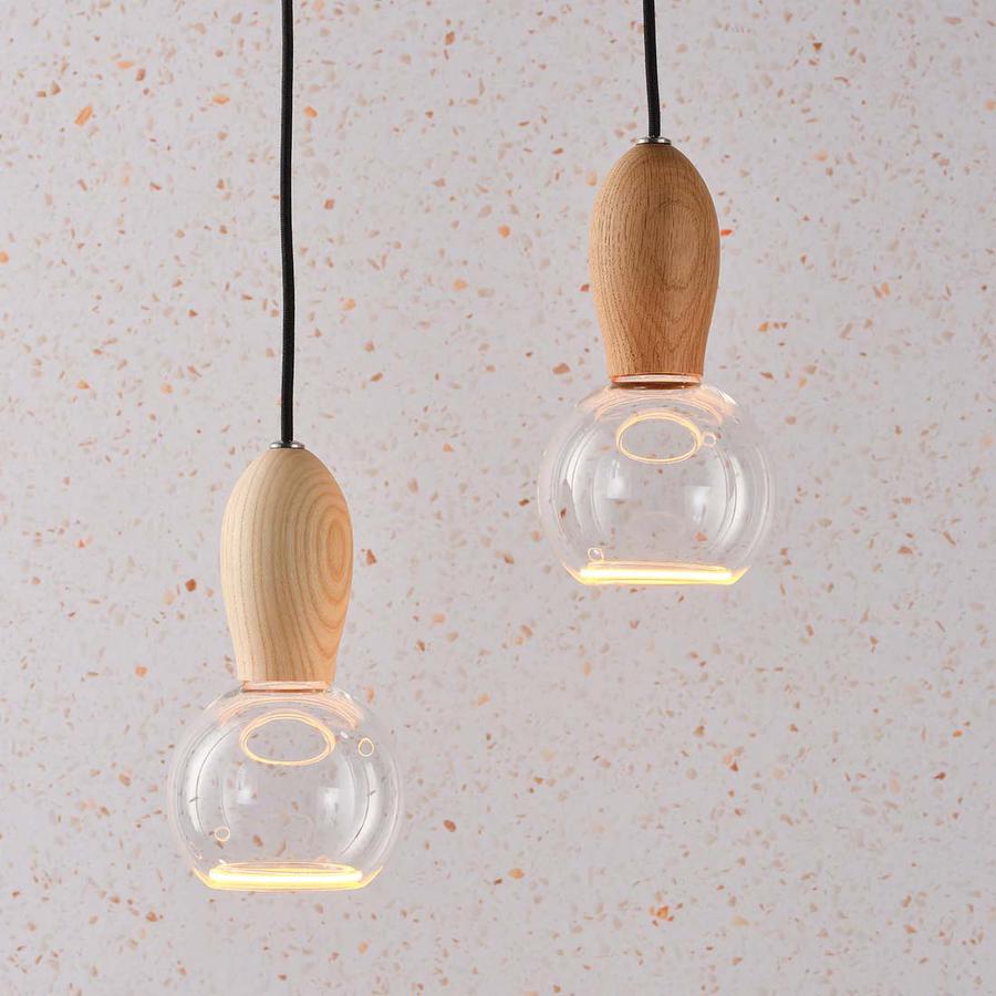 The beautiful Woody pendant light pictured here made from Oak and Ash and supplied by South Charlotte Fine Lighting