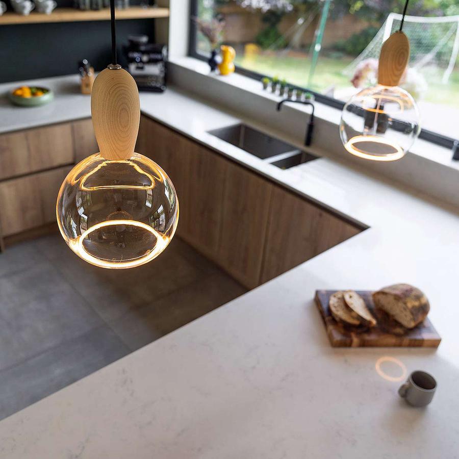 The Woody wooden pendant light can be used on its own or as part of a series of lights for use above a kitchen island.