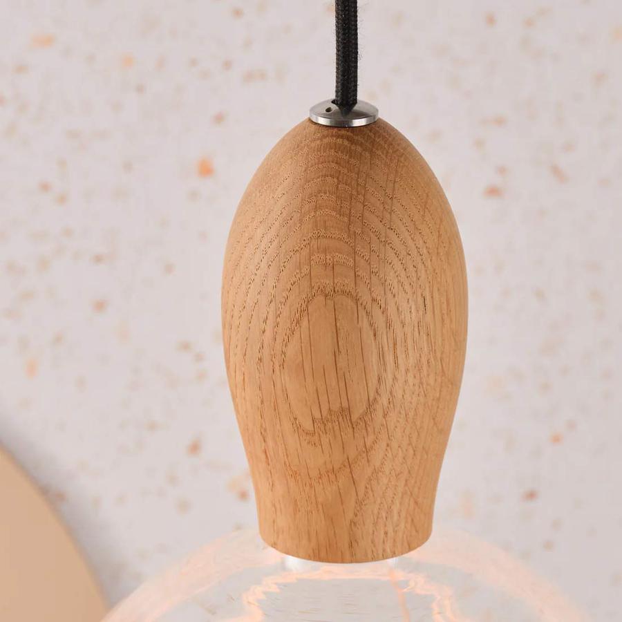 Exquisite grain detail on wood pendant lighting supplied by South Charlotte Fine Lighting