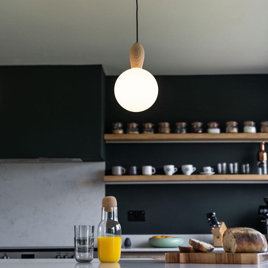 The elegant clean lines of the Woody pendant light, supplied by South Charlotte Fine Lighting, means it can make an elegant modern statement in almost any room in your home