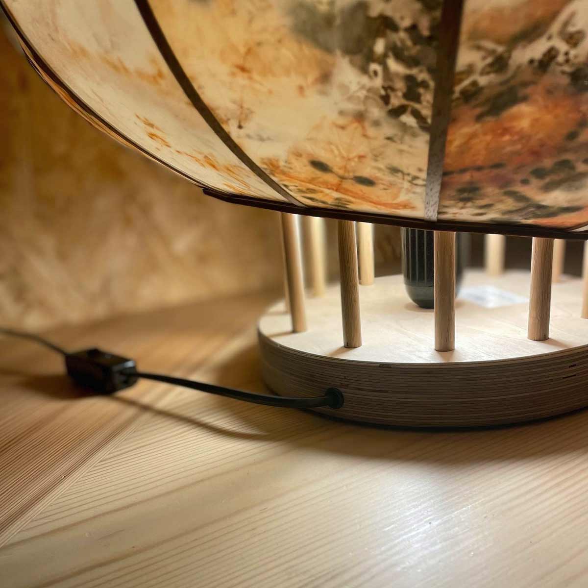 Artistic table lamp made from natural materials sold by South Charlotte Fine Lighting