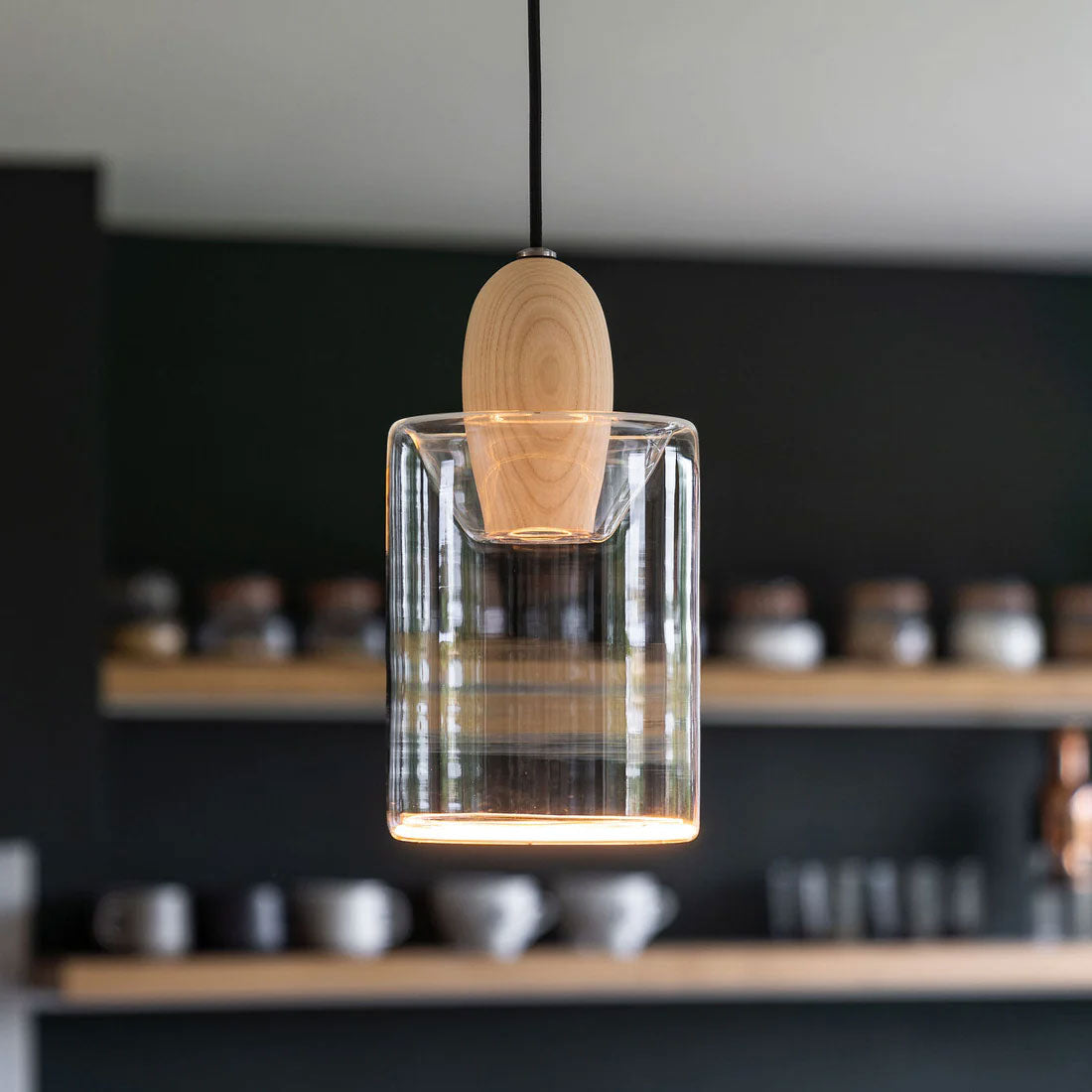You can hang the Azure Cylinder glass pendant light bulb in your kitchen, as shown here