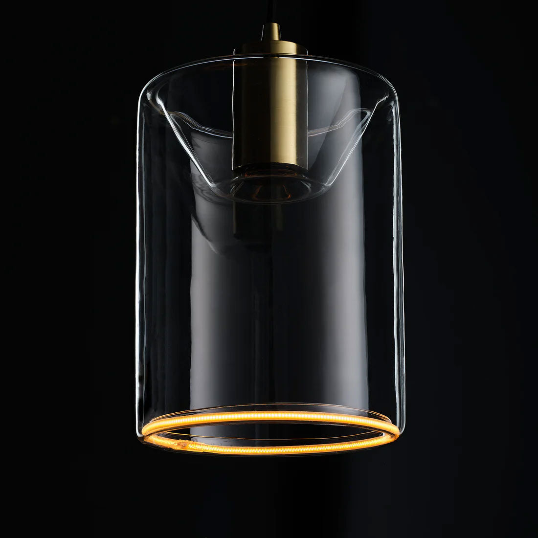 The Azure Cylinder is a large glass pendant light bulb made by Well Lit and sold by South Charlotte Fine Lighting