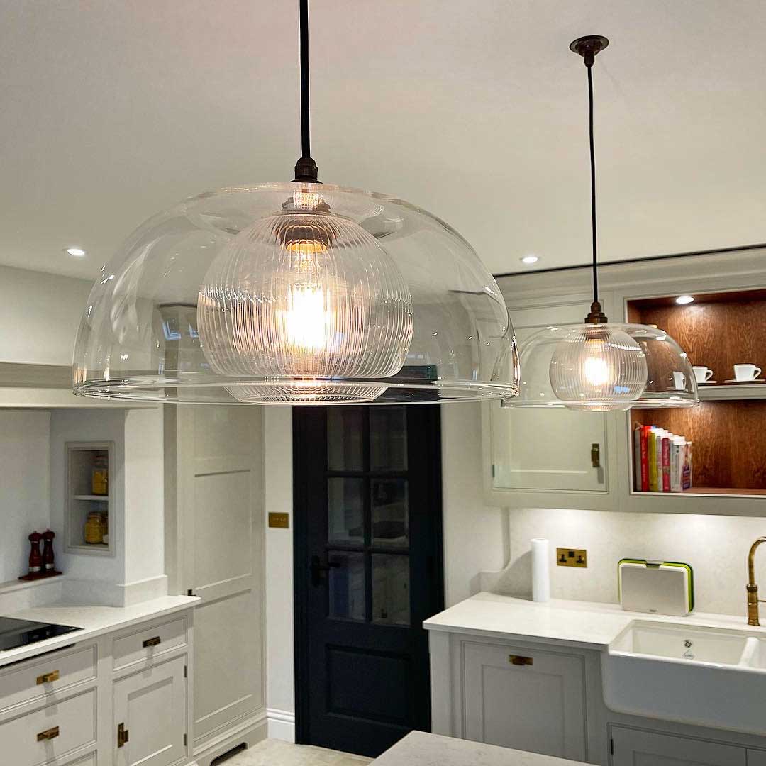 Glass modern pendant lighting made by Leverint and sold by South Charlotte Fine Lighting