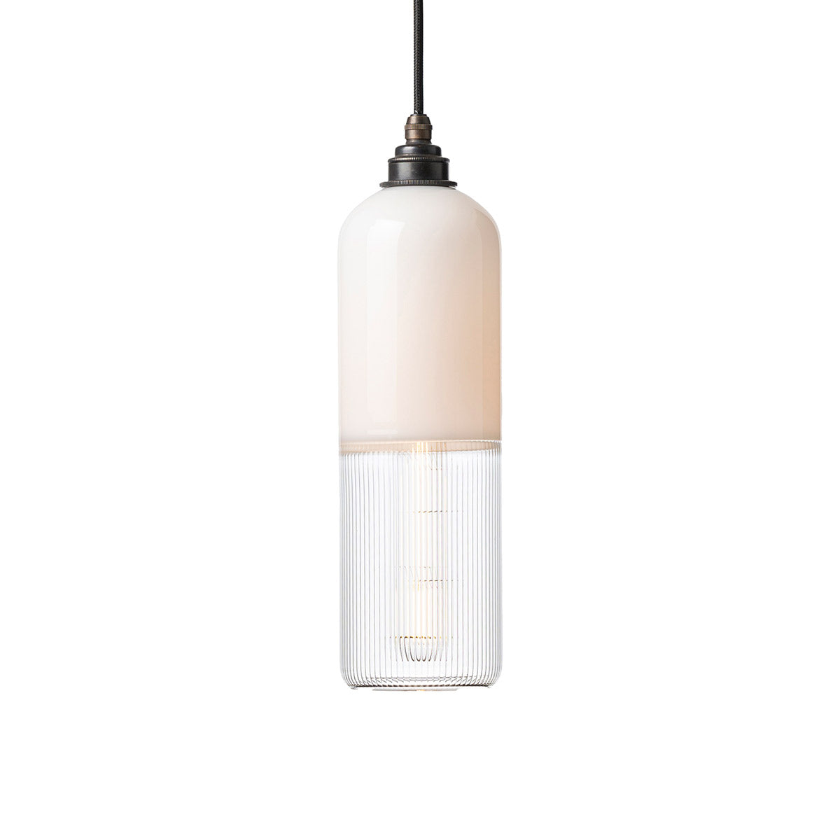 This coloured glass pendant light by Leverint features opaque glass on the top and fine ribbed glass on the bottom and is sold by South Charlotte Fine Lighting
