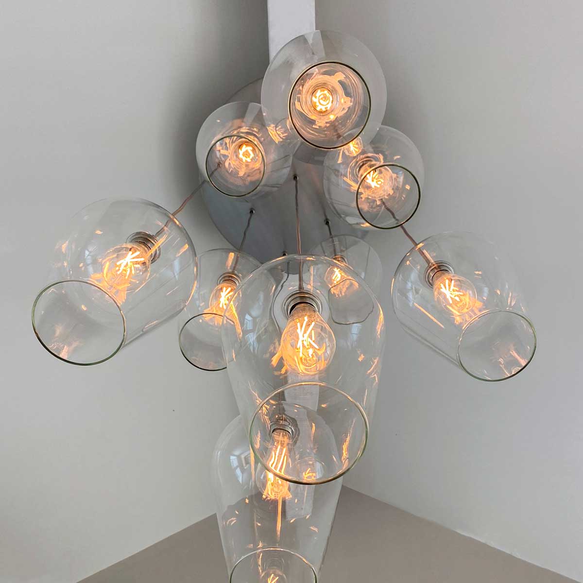 Blown glass pendant lights sold by South Charlotte Fine Lighting