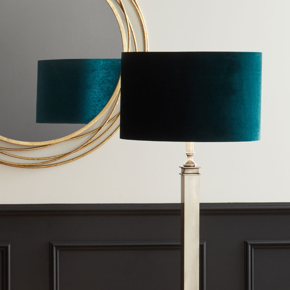 Bow Cylinder Forest Green Lamp Shade shown here on a floor lamp