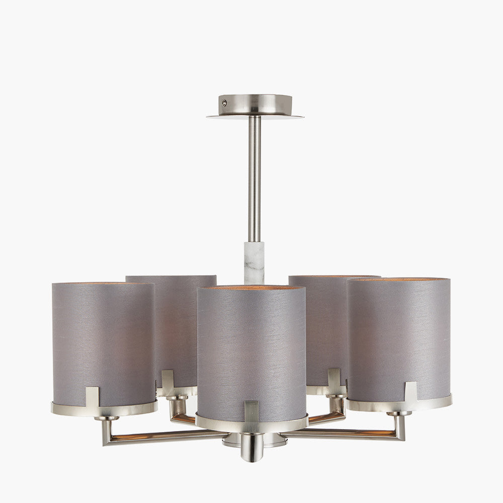 Brushed nickel pendant lighting and marble-effect stem  with lights illuminated