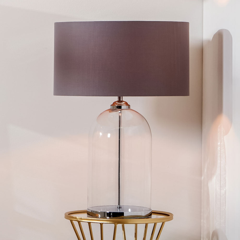 Cloche glass table lamp in living room setting