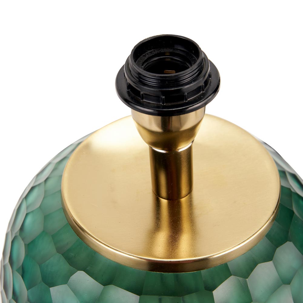 Close-up on stylish lampholder on Camila glass table lamp green base