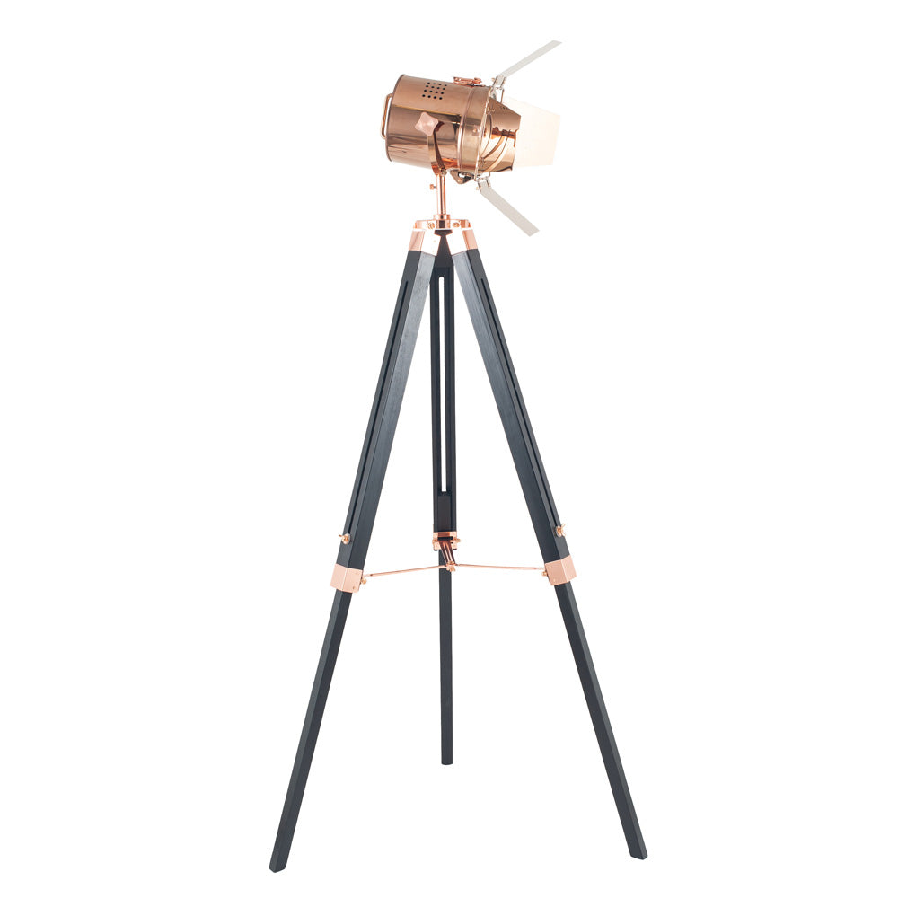 The Hereford tripod floor lamp in copper includes shutters to help you direct the light in your home
