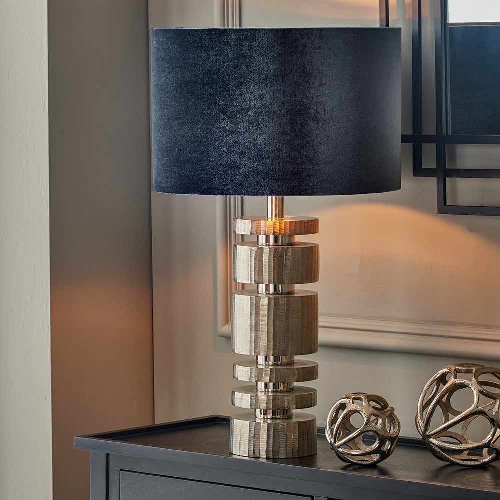 Elon metal table lamp, pictured here with a cylinder shade, is ideal for a living room