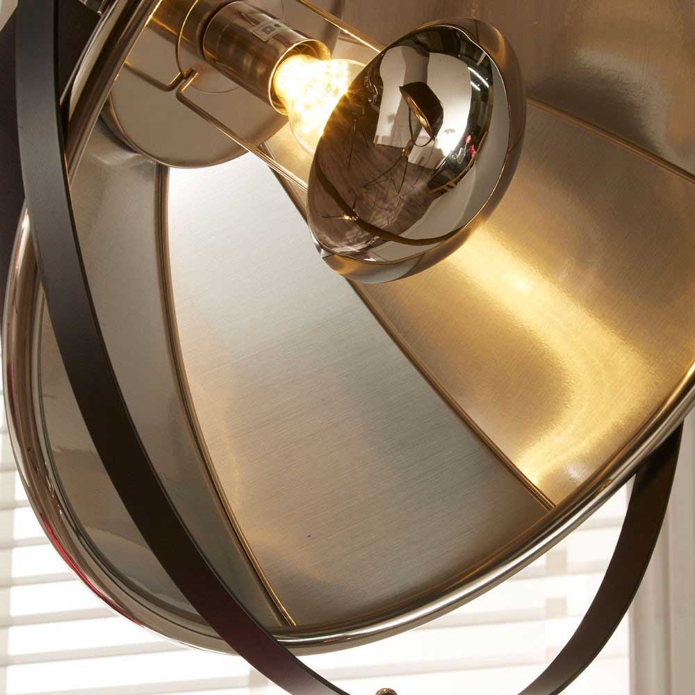 Close-up of diffuser which helps to create soft light from the Elstree Black and Silver Metal Tripod Floor Lamp, sold by South Charlotte Fine Lighting.