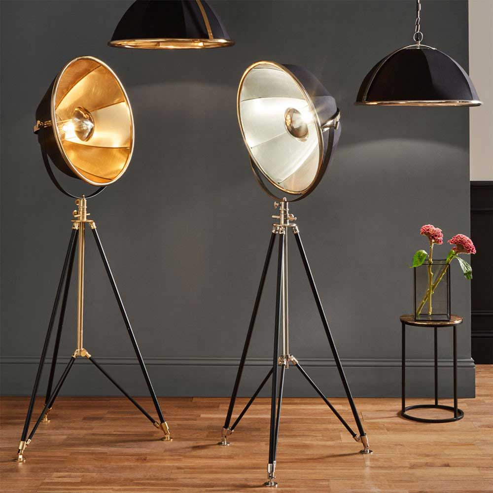 Elstree Black and Silver Metal Tripod Floor Lamp is shown here with a black and gold version, which can also be bought from South Charlotte Fine Lighting.