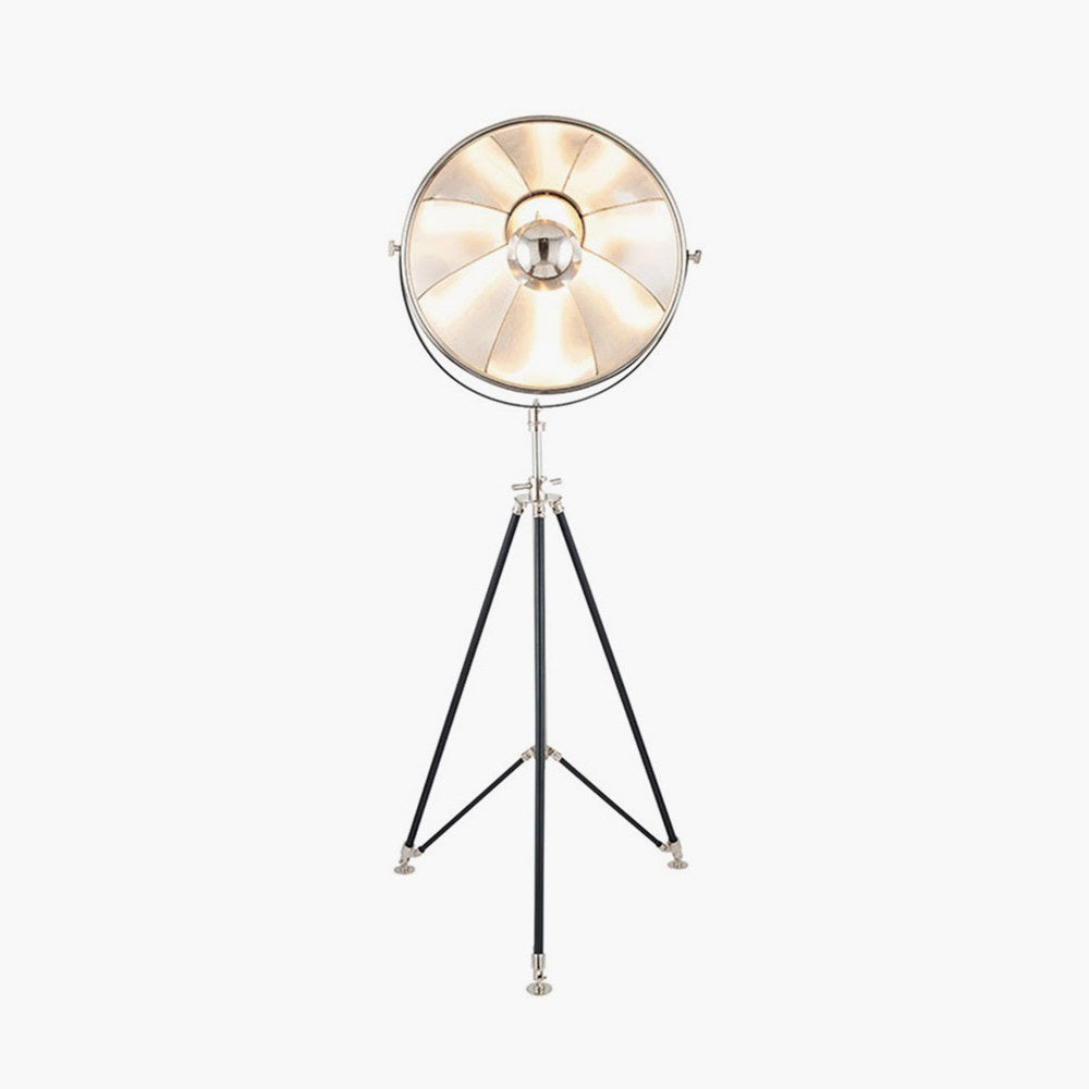Light switched on for Elstree Black and Silver Metal Tripod Floor Lamp.