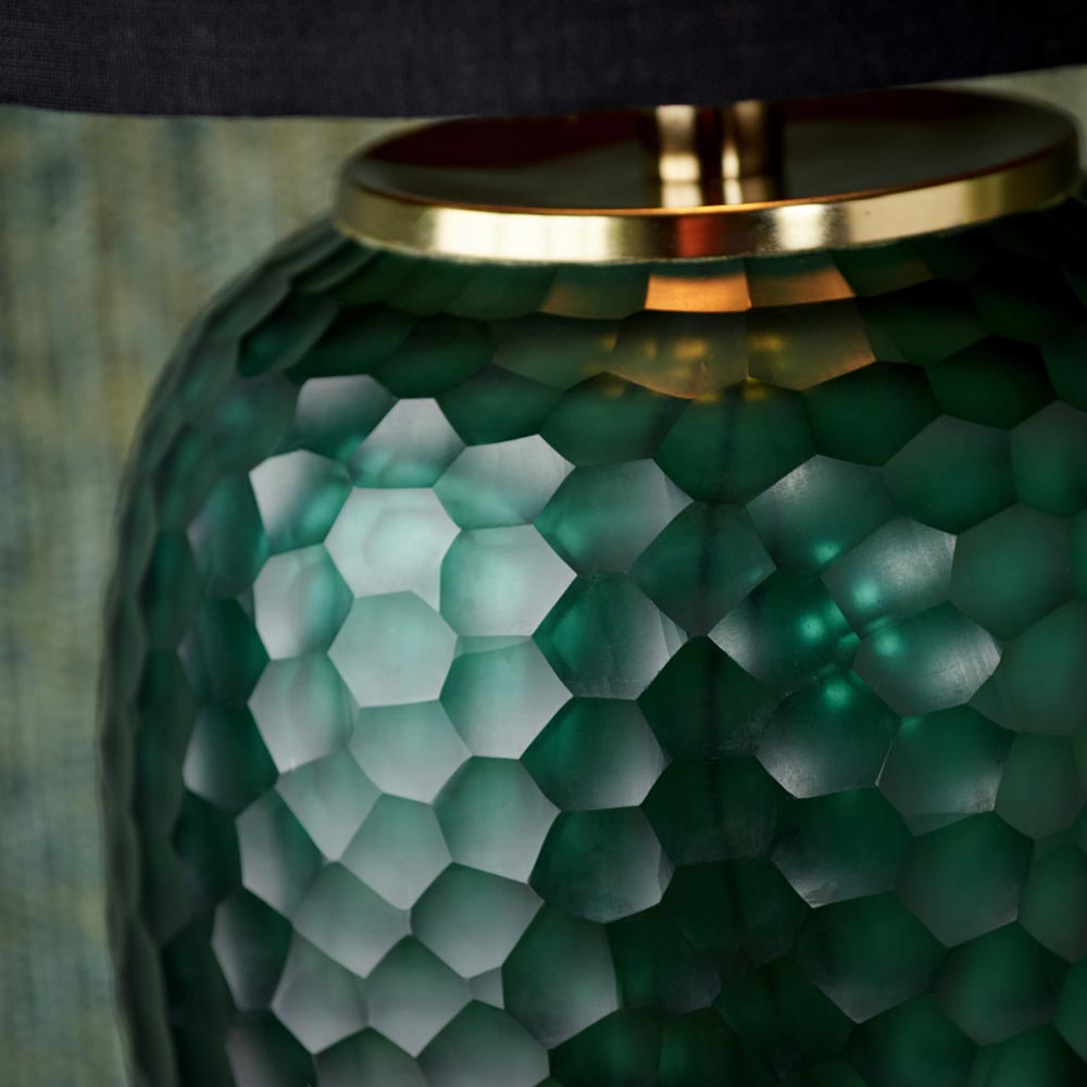 The Camila glass table lamp green can offer a suble accent colour in your home