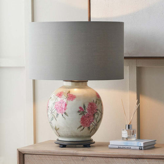 Vintage floral table lamp base, which is ideal for your living room, is pictured with optional cylinder lampshade.