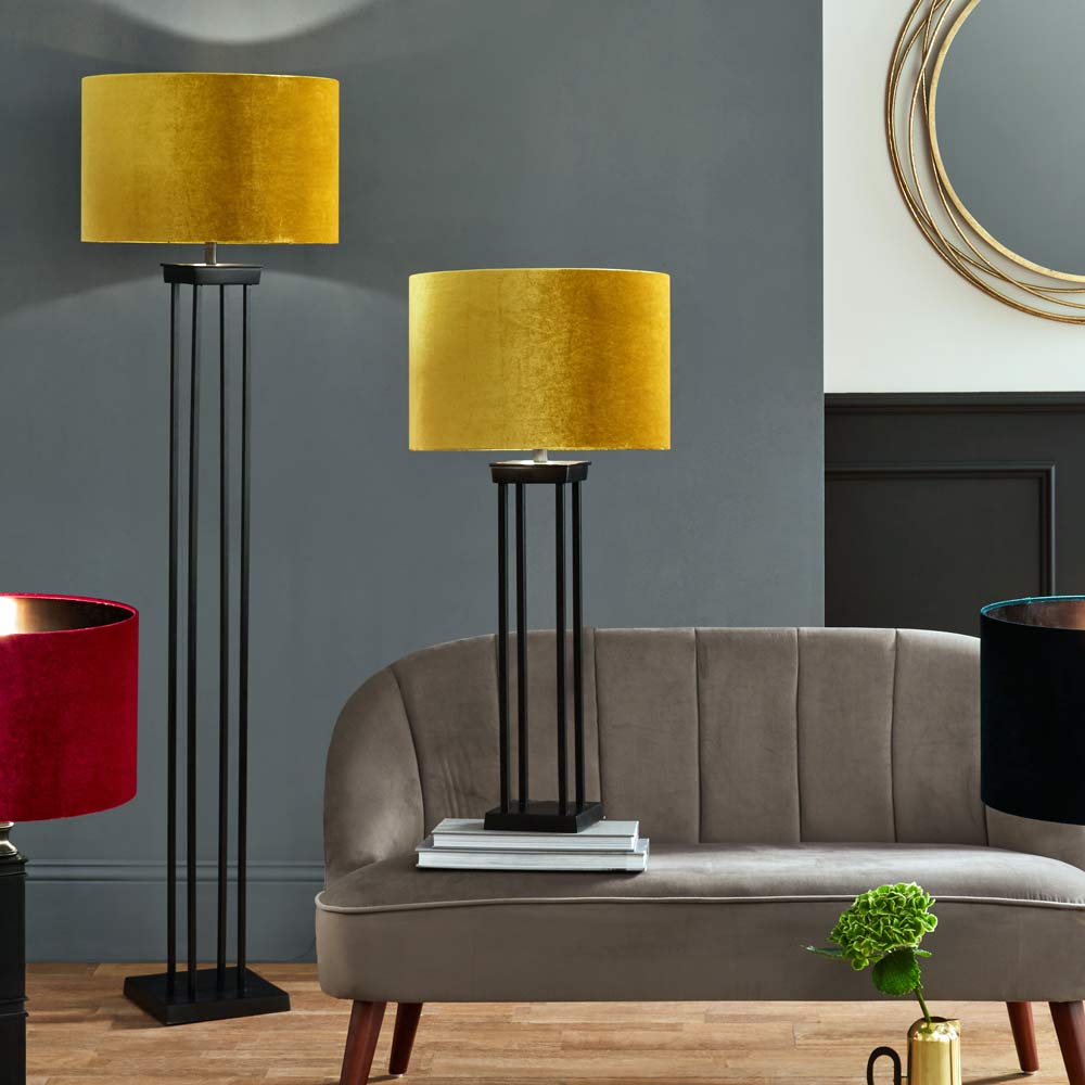 Langston black floor lamp with optional yellow velvet lampshade and, to the right, a table lamp from the same range