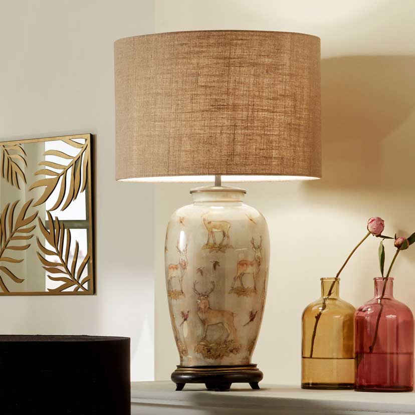 Lifestyle image of stag table lamp sold by South Charlotte Fine Lighting