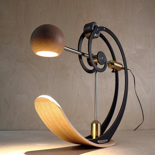 The Blott Works A-Type Balance Lamp is an innovative contemporary desk lamp sold by South Charlotte Fine Lighting