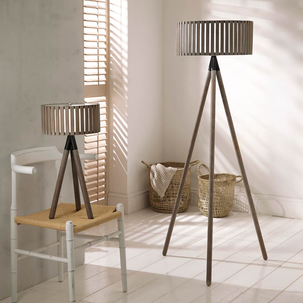 The Rabanne floor lamp tripod made from wood includes a table lamp in the same style