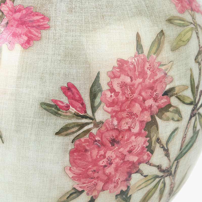 Rhododendron flowers on vintage floral table lamp.