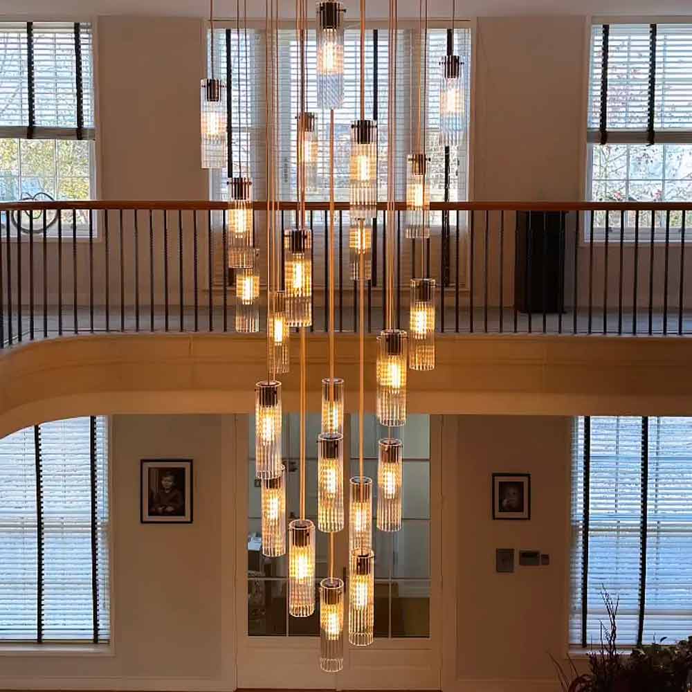 Ribbed glass pendant lighting cascade made and installed by Leverint