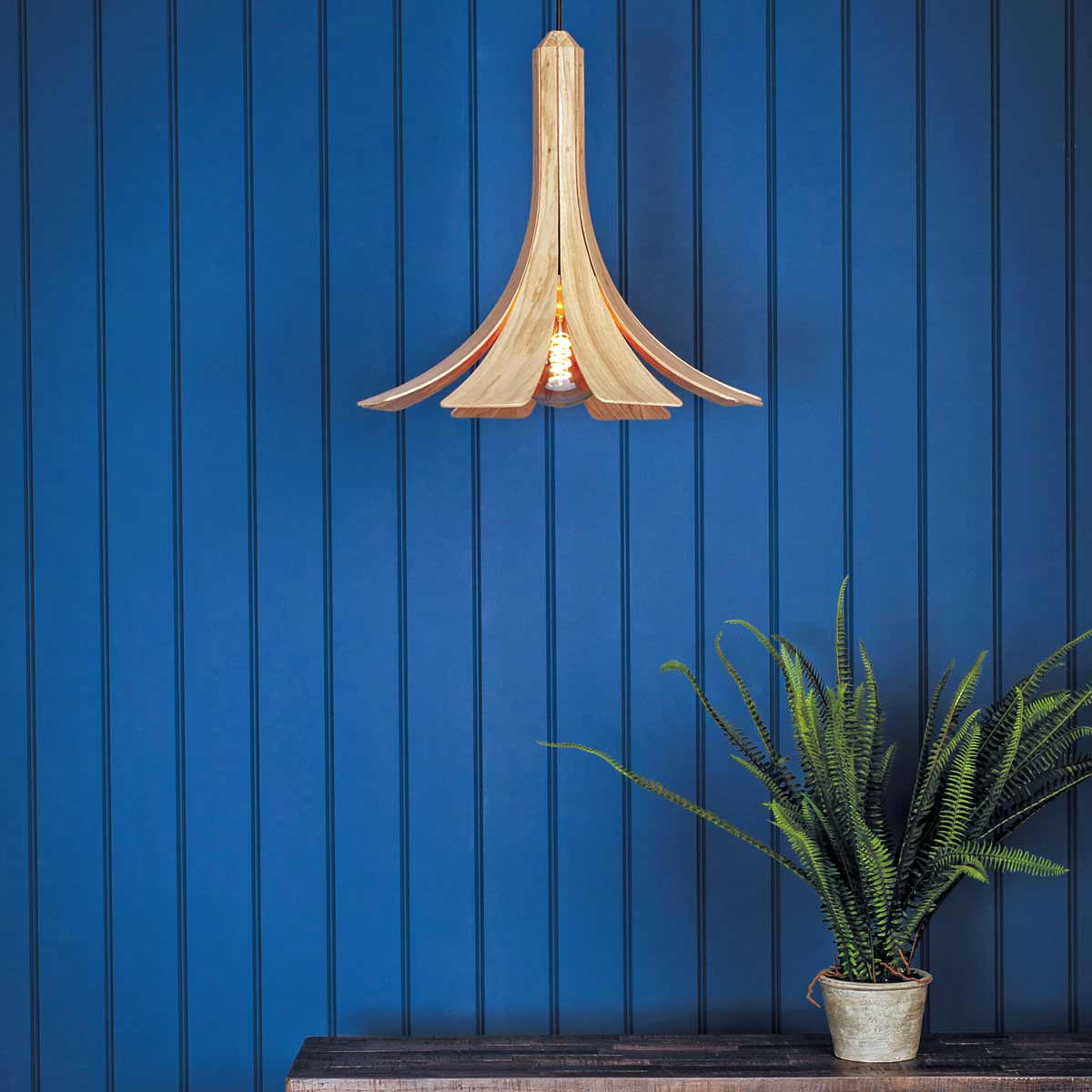 Wooden pendant light by Storm Furniture is sold by South Charlotte Fine Lighting