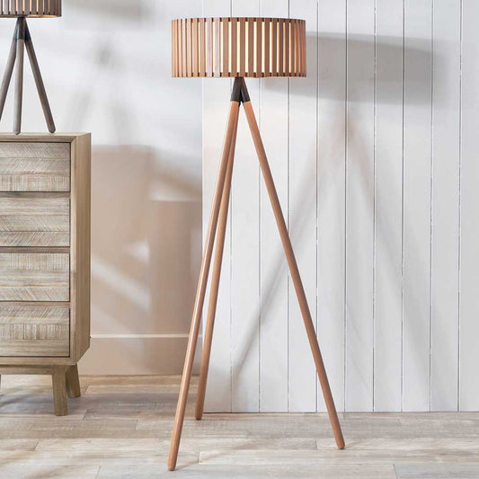 The Rabanne stand lamp made from wood produces elegant diffuse lighting