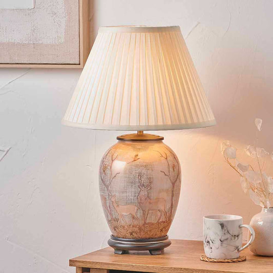 Lifestyle image of stag table lamp sold by South Charlotte Fine Lighting