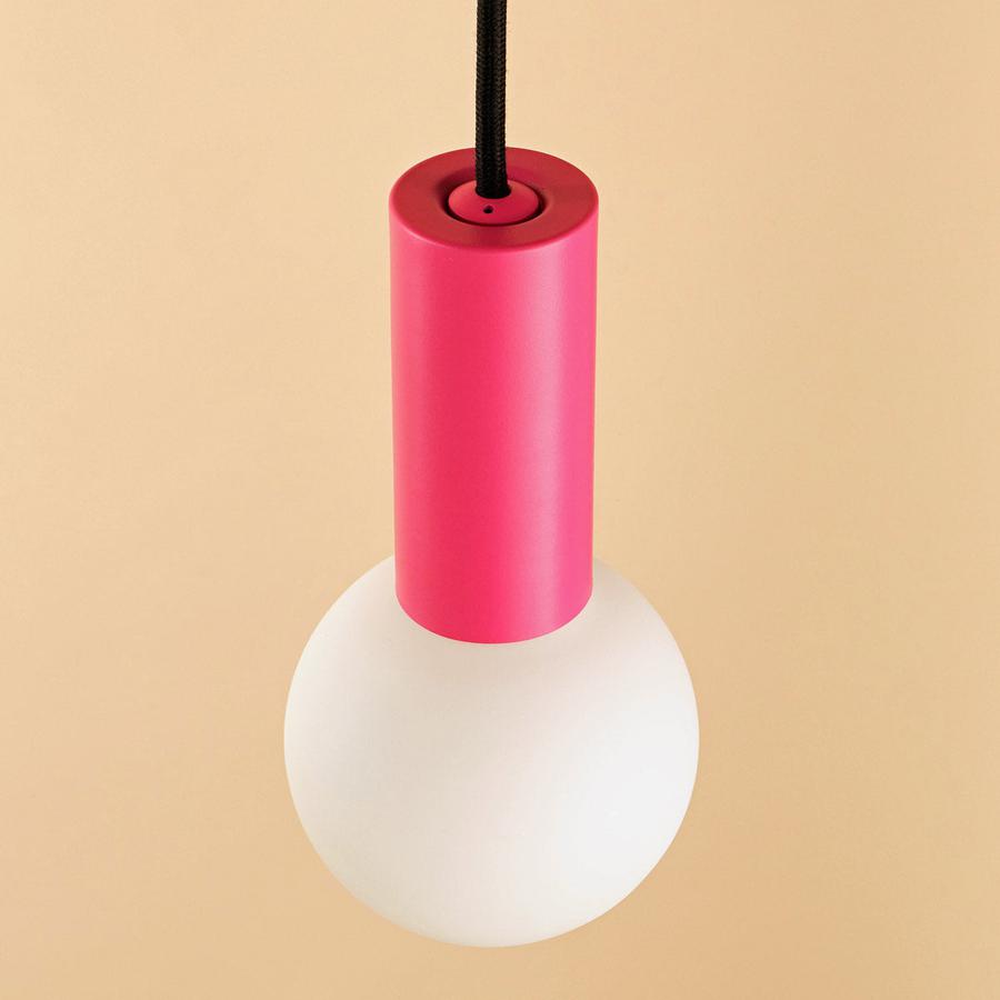 Well Lit Spin Pendant Light in Pink Positive, pictured here with the Well Lit Azure G95 LED Light bulb